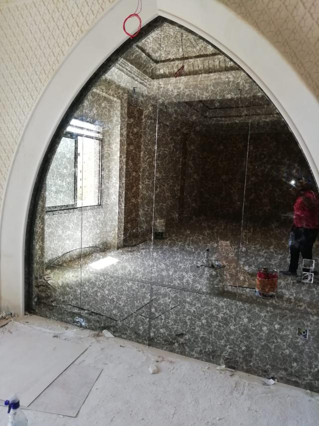 تكسية قوس بالمرايا